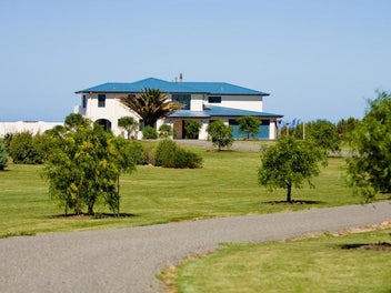 Beachfront Setting With All the Bells and Whistles