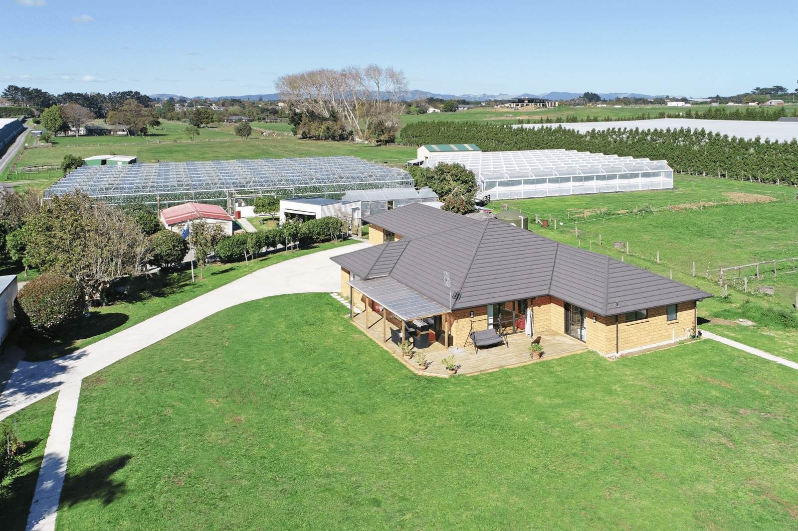 Commercial Greenhouses + Large Family Home — slide 2
