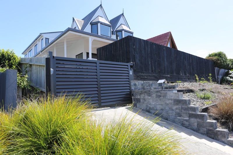 128 Beach Road, Castor Bay, Auckland - Carousel 1